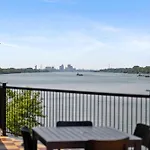 Top-Floor Riverside Retreat Timeless Charm & Views
